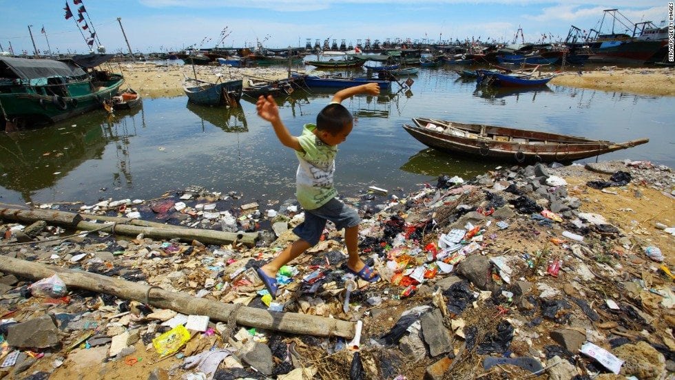 image China 140624165225 chinese boy ocean trash horizontal large gallery