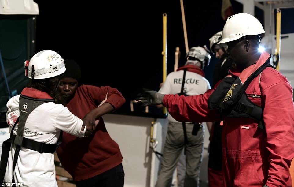 image ITALIA MIGRANTES 4D21FBC300000578 5827965 A woman is helped by crew on the the MV Aquarius a search and re a 22 1528719013839