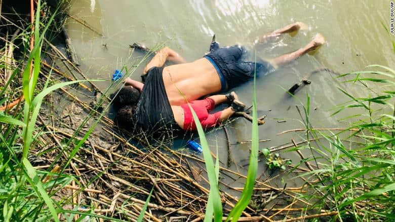 EDS NOTE: GRAPHIC CONTENT - The bodies of Salvadoran migrant Oscar Alberto Mart??nez Ram??rez and his nearly 2-year-old daughter Valeria lie on the bank of the Rio Grande in Matamoros, Mexico, Monday, June 24, 2019, after they drowned trying to cross the river to Brownsville, Texas. Martinez' wife, Tania told Mexican authorities she watched her husband and child disappear in the strong current. (AP Photo/Julia Le Duc)