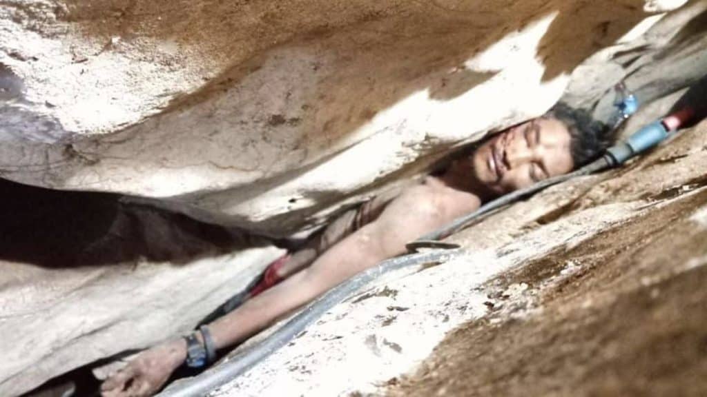image cambodia cave wedged between rocks