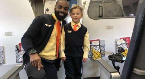 image a man wearing a suit and tie stephen sj awwad an honorary allegiant flight attendant for a day shows 439949