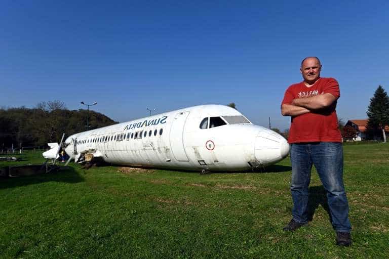 image a plane sitting on top of a grass covered field robert sedlar said parking a plane next to his house 580951