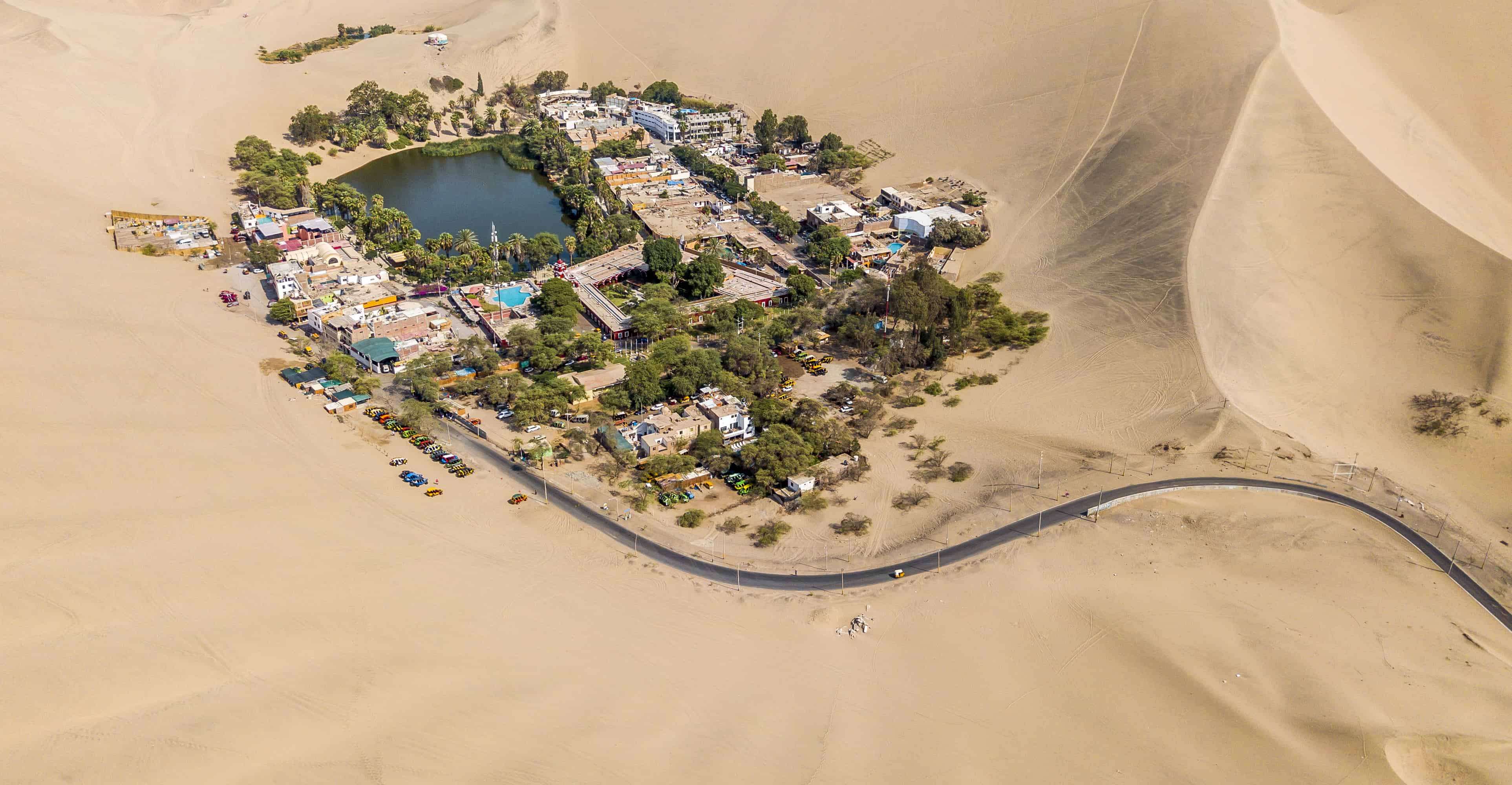 aerial photography of town in the middle of the desert