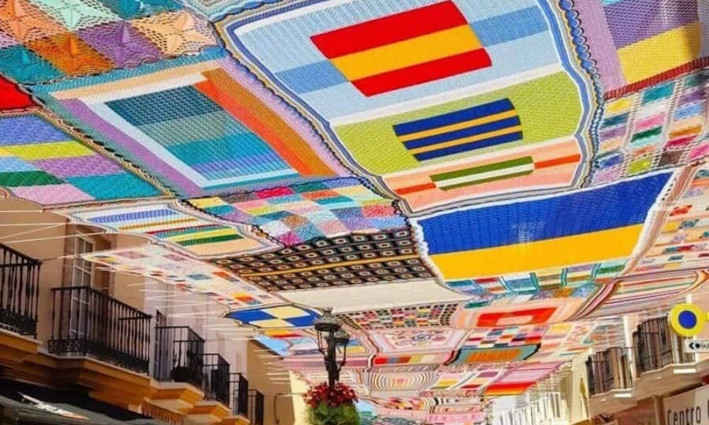 image ola de calor en Europa artesanas malaga tejen toldo