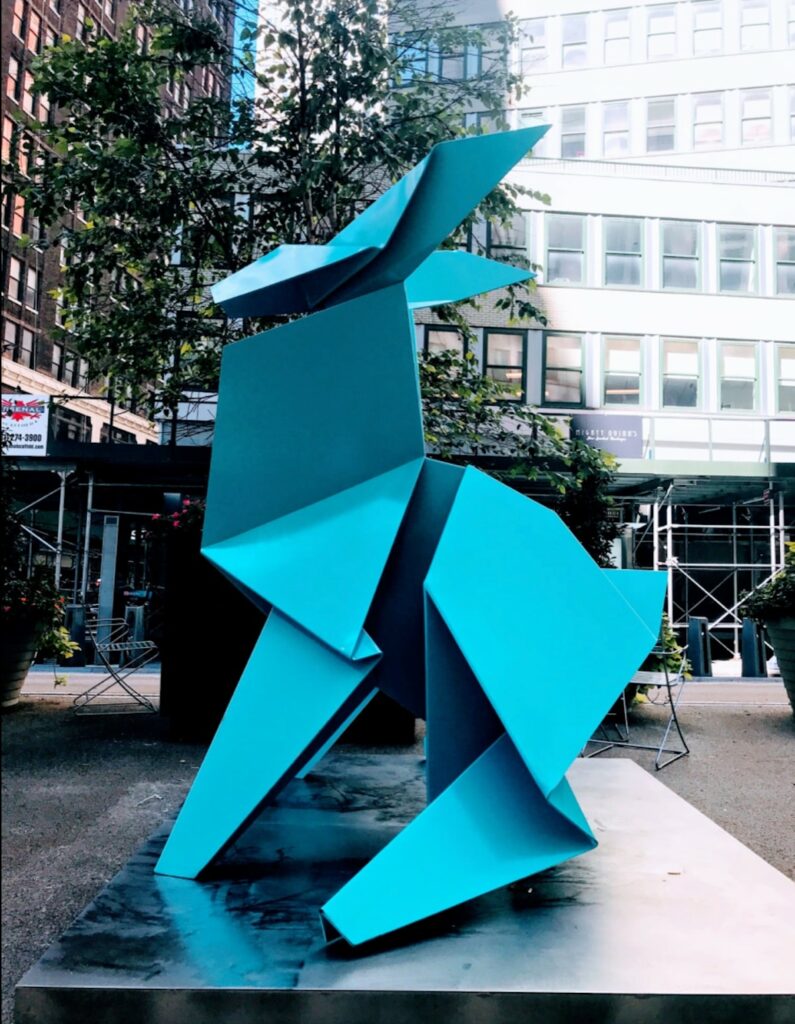 image barrio Garment District hacer transformations giant origami sculpture garment district nyc 7