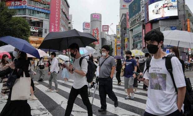 Peatones - Japón cierra fronteras frente a la nueva variante de COVID-19