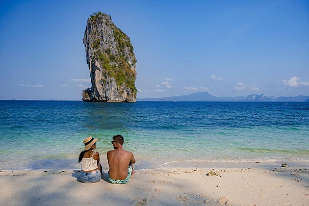 pngtree-asianeuropean-couple-on-koh-poda-beach-thailand-crystal-beautiful-beach-photo-image_35614612