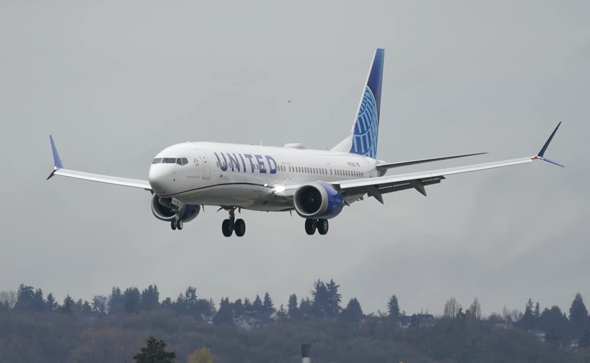 File-This Nov. 18, 2020, file photo shows a Boeing 737 Max 9 built for United Airlines landing at King County International Airport - Boeing Field after a test flight from Moses Lake, Wash., in Seattle. Boeing is seeing more cancellations for its long-grounded 737 Max jet. The company said Tuesday, Dec. 8, 2020, that orders for 88 of the planes were canceled in November. (AP Photo/Ted S. Warren, File)