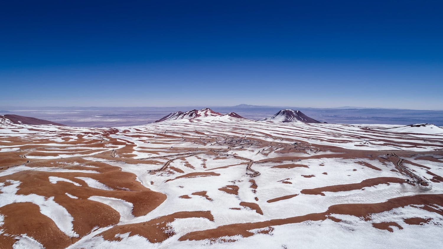 The Atacama Desert is one of the most extreme places on Earth. The average annual rainfall in this region barely reaches 15 millimetres, and the dry, arid conditions — which have lasted for the past three million years — make it one of the most wonderful places from which to observe the Universe. This image shows the Atacama Desert’s Chajnantor Plateau in the aftermath of something extraordinary in this region — snowfall.