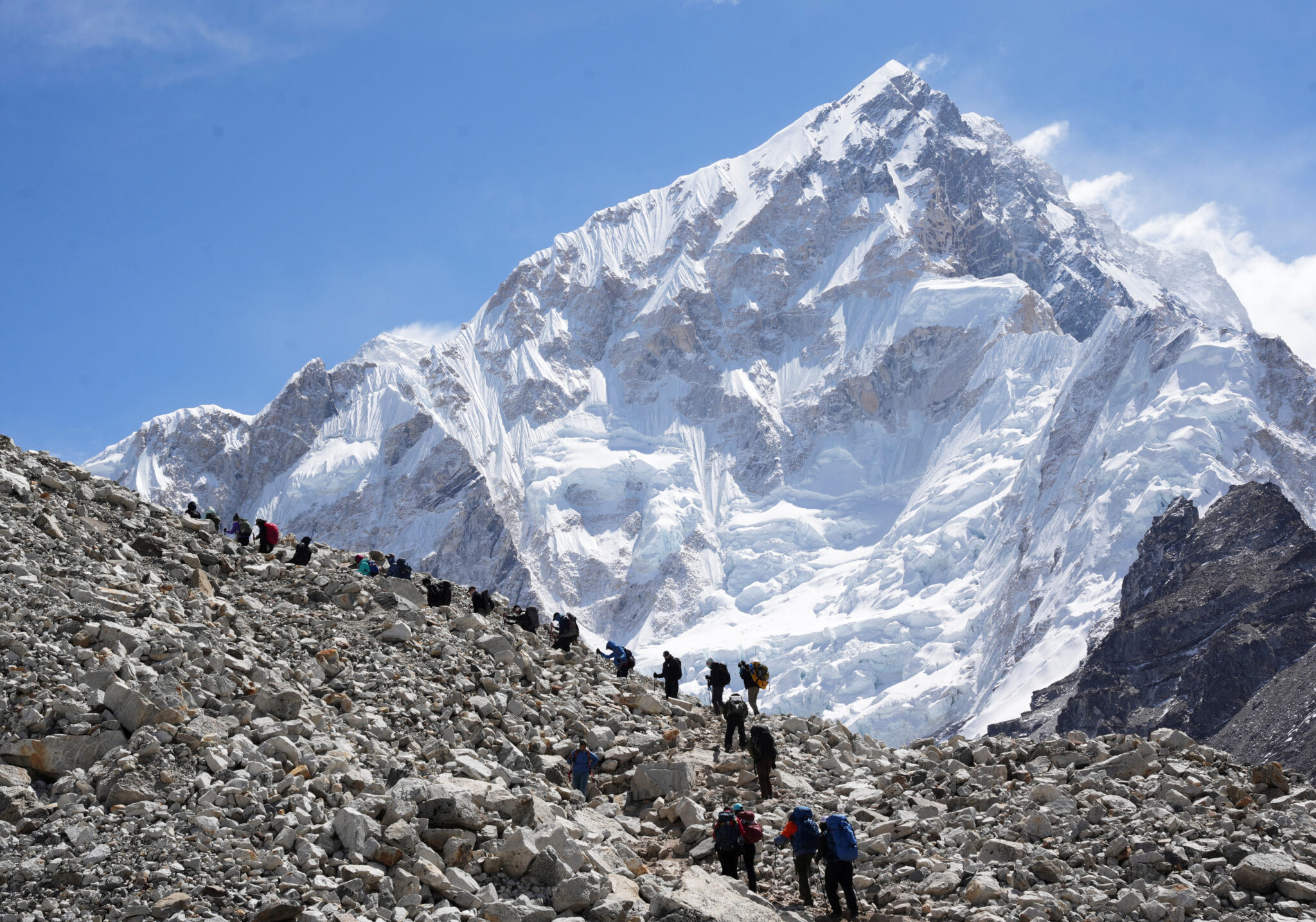 Mountaineers and trekkers head towards the Everest base camp from Lobuche in the Solukhumbu district, also known as the Everest region Mountaineers and trekkers head towards the Everest base camp from Lobuche in the Solukhumbu district, also known as the Everest region, Nepal April 12, 2025. REUTERS/Purnima Shrestha