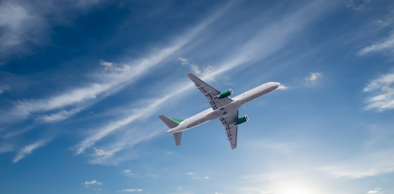 Airplane,With,Beautiful,Sky,On,Background. Airplane,With,Beautiful,Sky,On,Background.