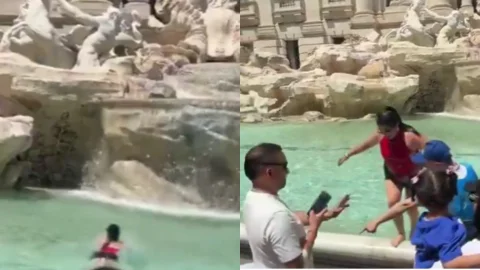 TuristaSeLanzaALaFontanaDiTrevi