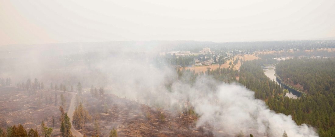 Smoke billows from the Old Trails Fire as wildfires burn in Spokane, Washington, U.S., August 2, 2026. REUTERS/David Ryder