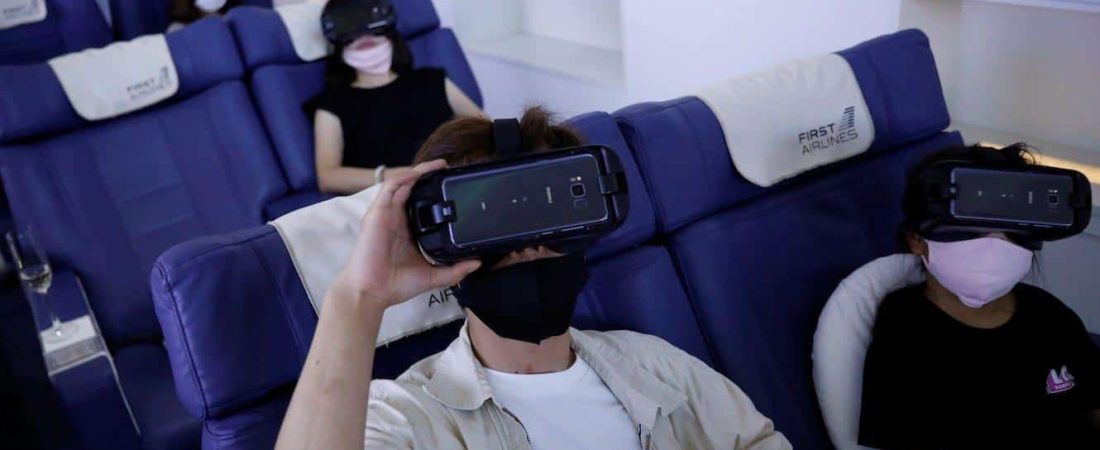 customers-flight-seats-use-virtual-reality-vr-devices-first-airlines-provides-vr-flight-experiences-including-360-degree-tours-cities-and-meals-tokyo-japan-august-12-2020-kim-kyung-hoon-reuters-2040613