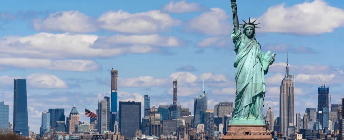 The Statue of Liberty over the Scene of New York cityscape river side which location is lower manhattan,Architecture and building with tourist concept