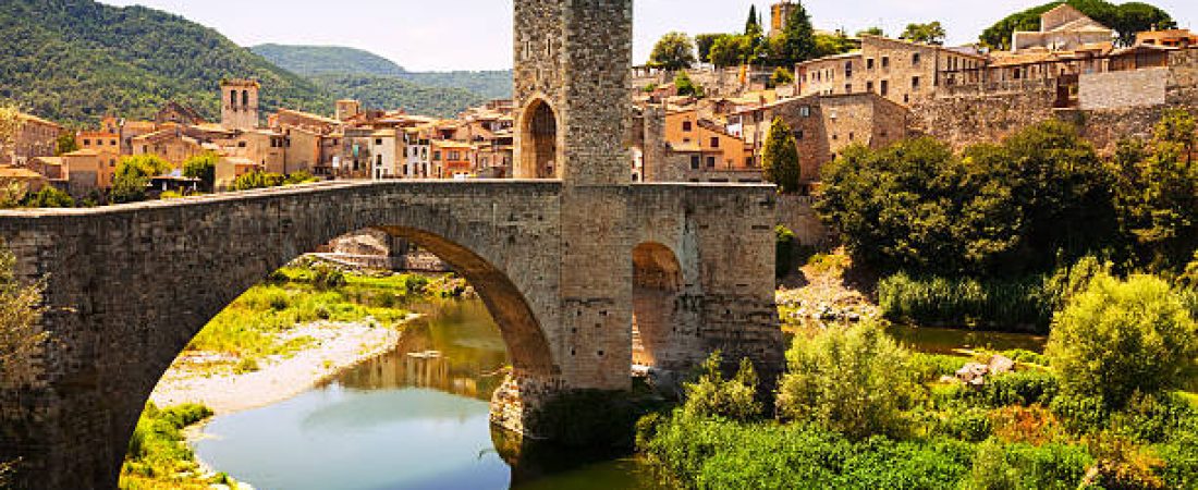 Medieval bridge with antique gate, built in the 12th century. Besalu, Catalonia