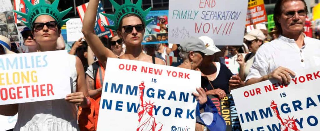 Demonstrators participate in "Keep Families Together" march to protest Trump administration's immigration policy in Manhattan, New York, U.S., June 30, 2018.  REUTERS/Shannon Stapleton - RC161CDE46D0