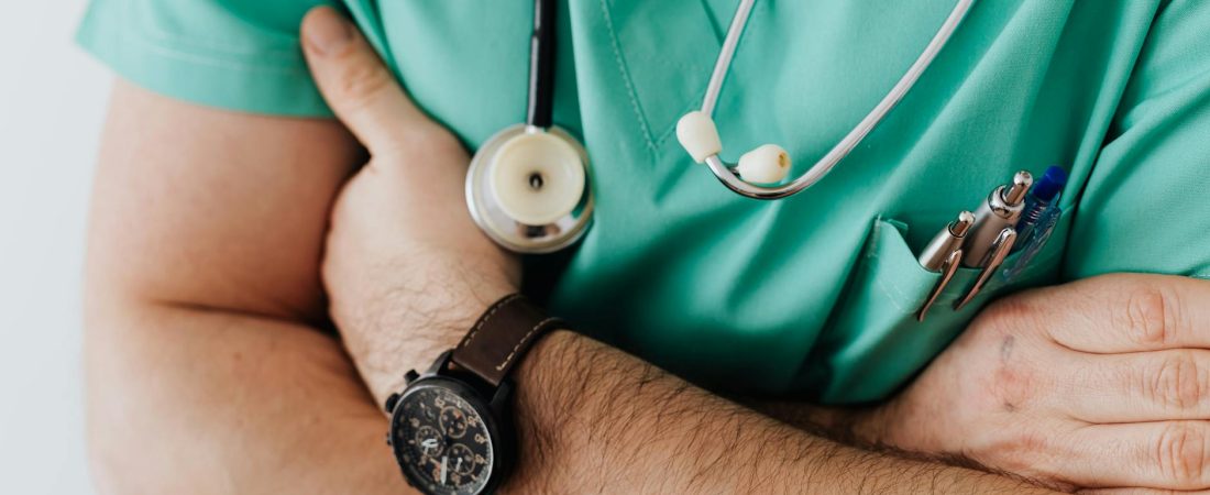 crop doctor with stethoscope in hospital