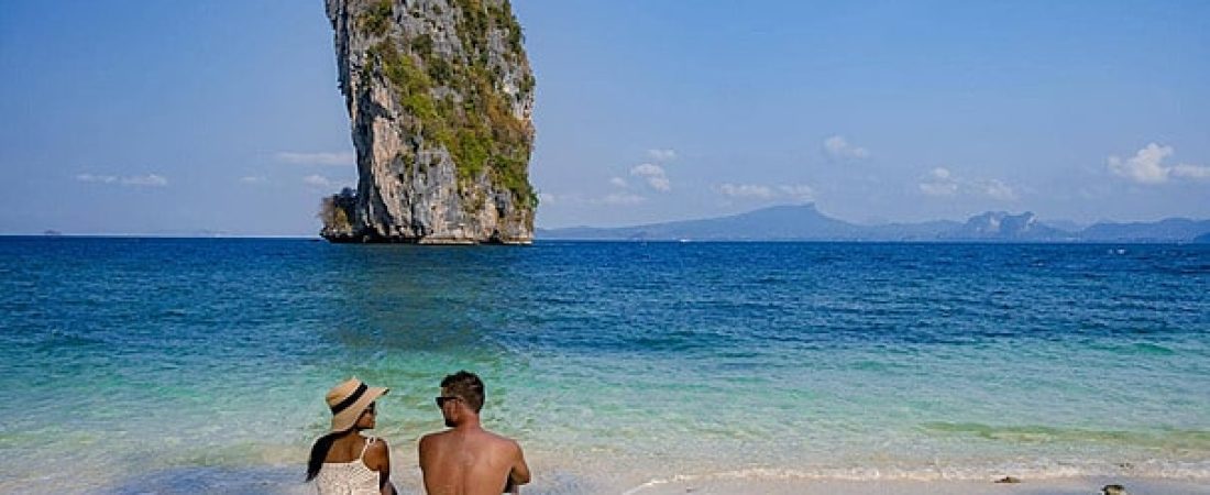 pngtree-asianeuropean-couple-on-koh-poda-beach-thailand-crystal-beautiful-beach-photo-image_35614612