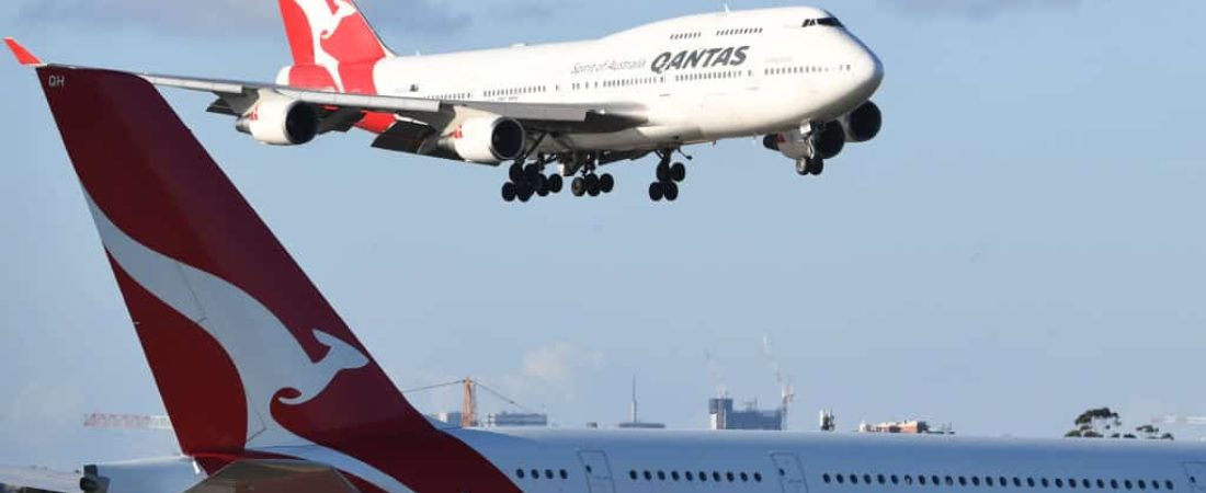 SYDNEY, AUSTRALIA - SEPTEMBER 30:  Qantas flight number 4 from Honolulu, a Boeing 747-400 aircraft flies over a Qantas A380 aircraft as she arrives at Sydney Airport on September 30, 2018 in Sydney, Australia. The Boeing 747, the "Jumbo Jet" celebrates its 50th birthday today having first rolled out of its custom-built assembly plant in Everett, Washington, USA on September 30th, 1968. The "Queen of the Skies" as she is affectionately called has been a favourite aircraft of millions of passengers for her entire flying life.  (Photo by James D. Morgan/Getty Images)